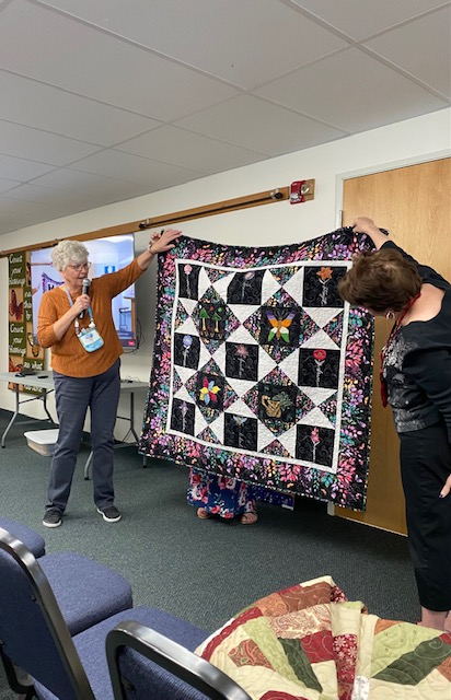 Jane Szabo shares her African charity quilt as she gives back to the African girls in need